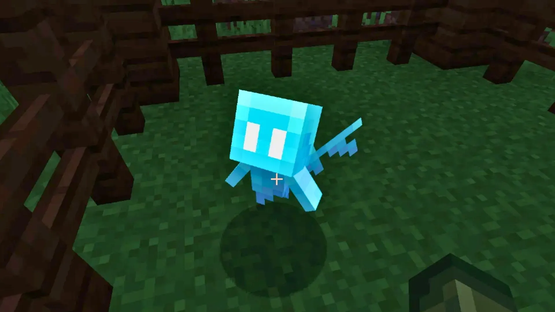 The small blue Allay mob — the 2021 Mob Vote winner — floating in a wooden fenced pen in Minecraft