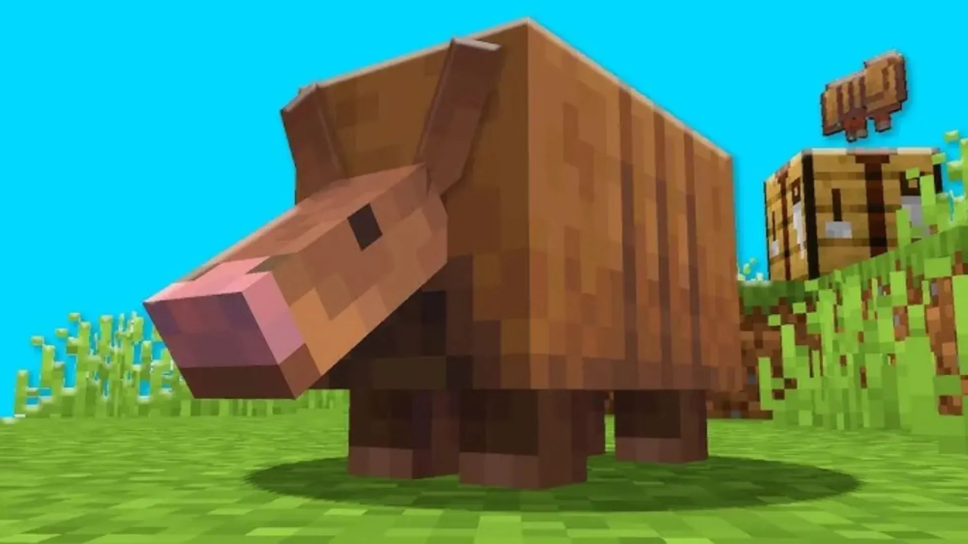 A large brown Minecraft Sniffer mob with its long pink snout in a grassy biome, with a barrel visible in the background